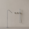 Modern Angled Floor Mounted Bathtub Filler with Dual Knob Control and Handheld