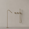 Modern Angled Floor Mounted Bathtub Filler with Dual Knob Control and Handheld