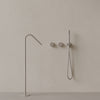 Modern Angled Floor Mounted Bathtub Filler with Dual Knob Control and Handheld