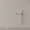 Modern Angled Floor Mounted Bathtub Filler with Dual Knob Control and Handheld